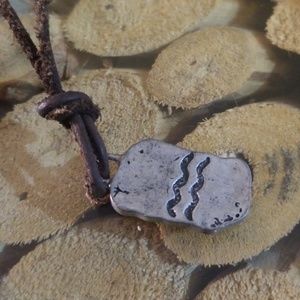 Aquarius steel and leather necklace